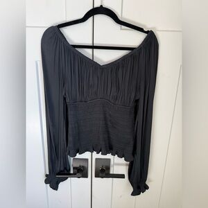 Like new GAP Black Off-Shoulder Blouse with smocked bodice. Size Small.